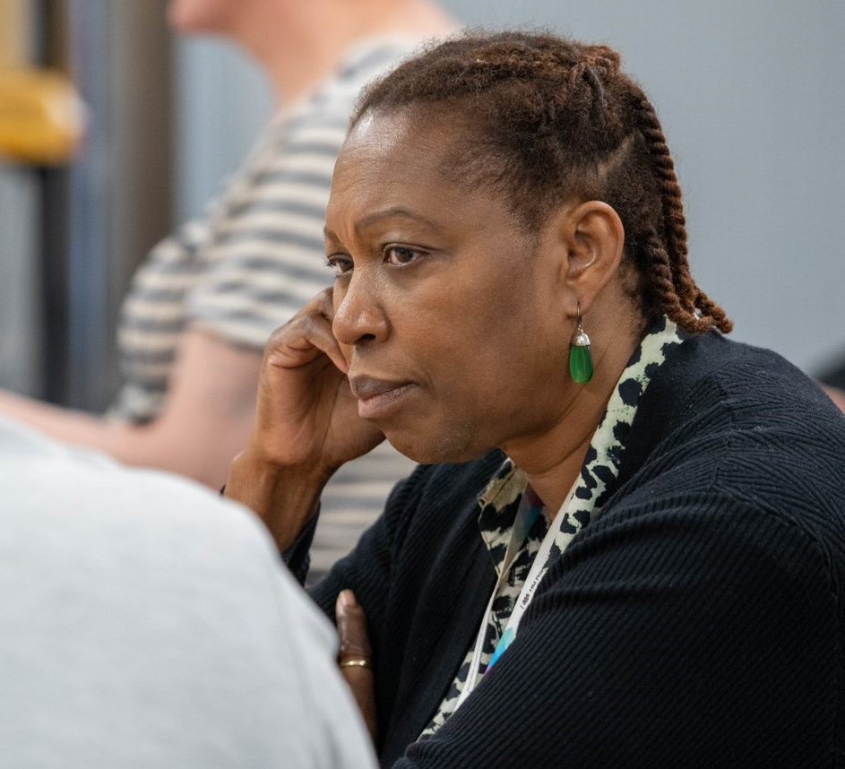 Female PSO sitting down and concentrating