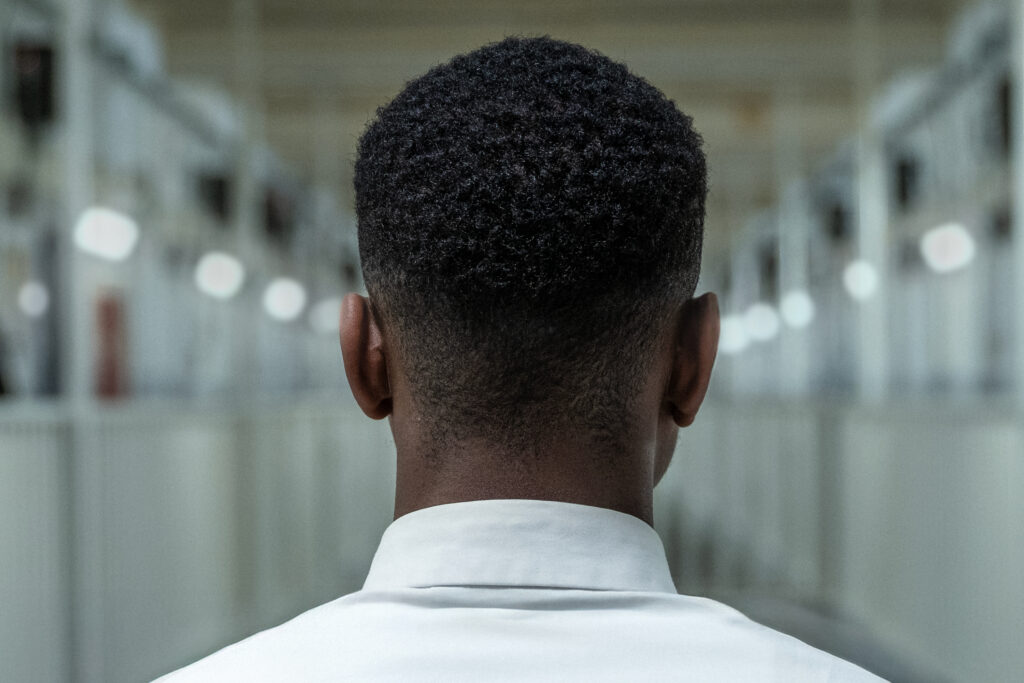 A male prison leader on a prison wing