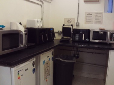 Photograph of the self-catering facilities including toasters, grills, microwaves and fridges.