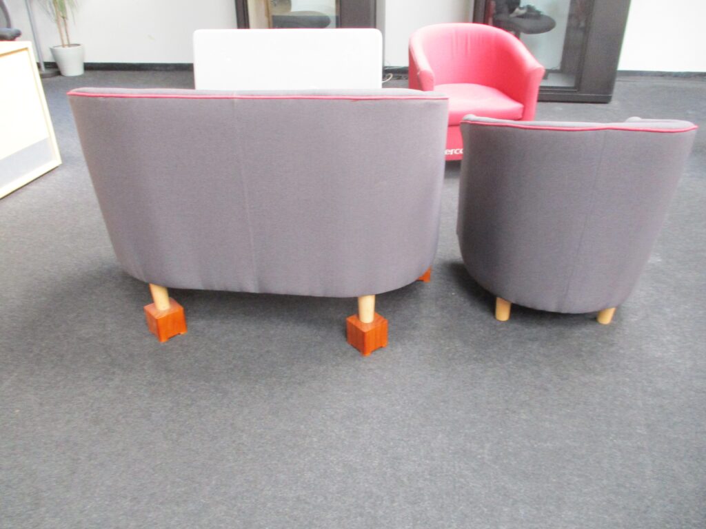 Photograph of chairs in the visits hall that have had their height raised so that they are easier for people with hampered mobility to get in and out of.