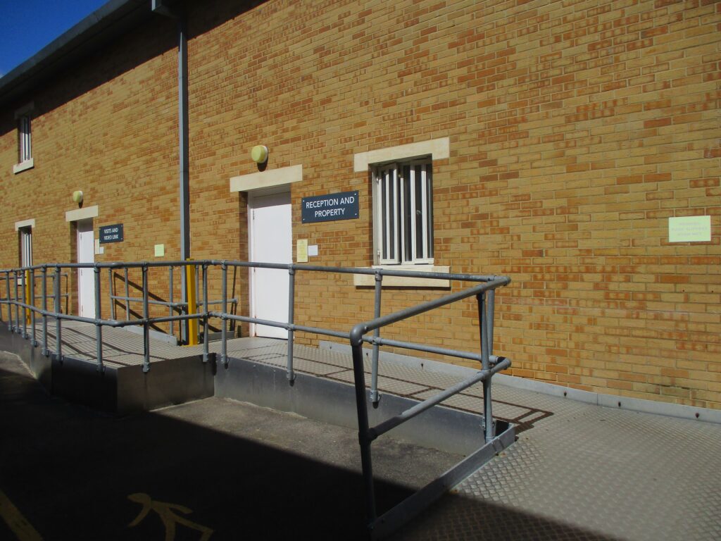 Photograph of the entrance to reception, with a ramp to make access easier.