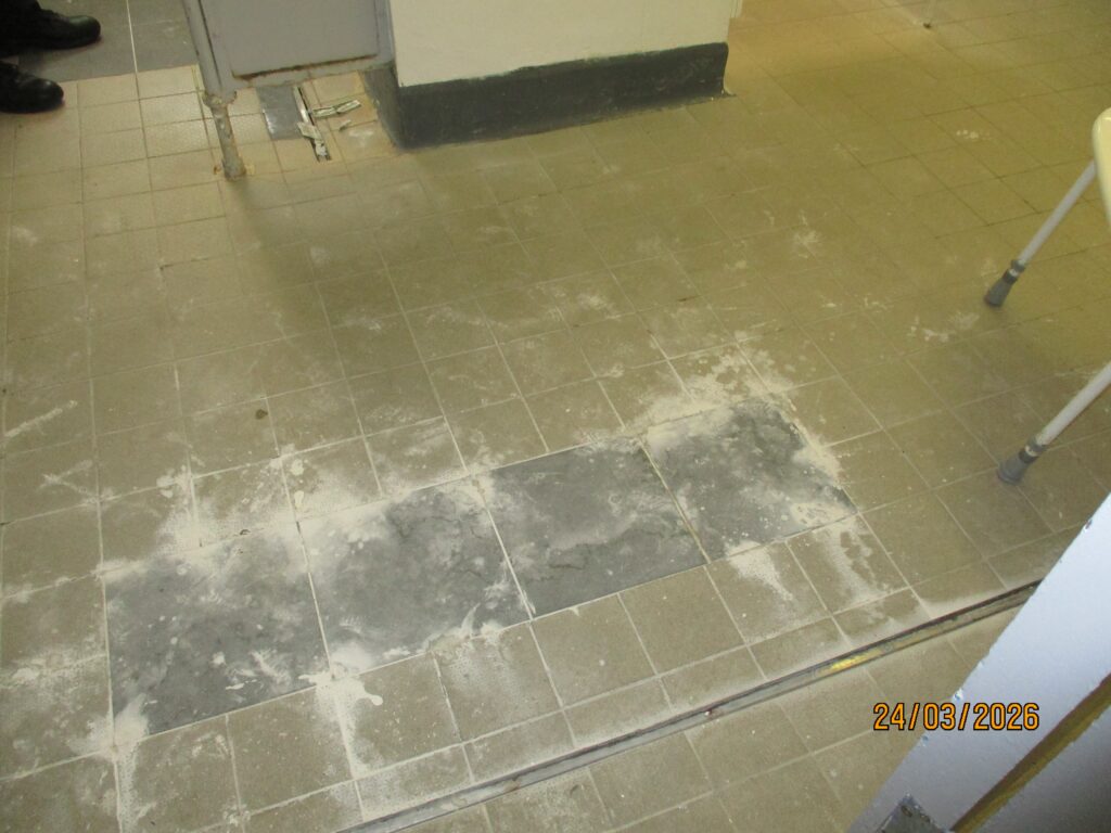 Photograph of a dirty floor in a shower cubicle on the Pankhurt unit.