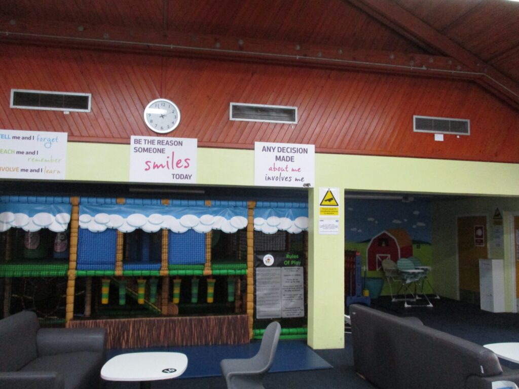 Photograph of the entrance to the children's play area in the visits hall.