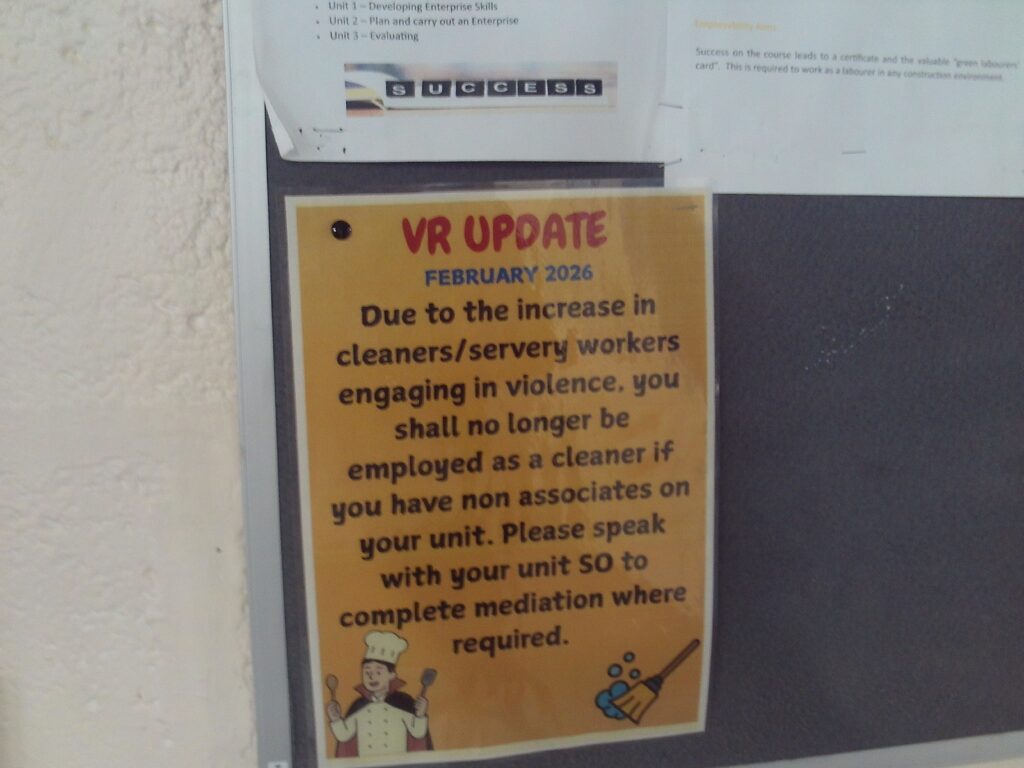 Photograph of a poster on a residential unit explaing how incentives for good behaviour work.