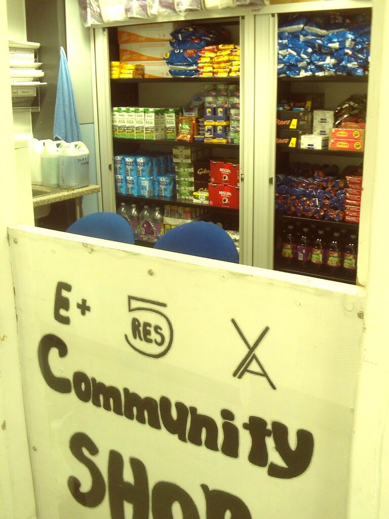 Photograph of the 'community shop', with a range of products available to purchase visible 