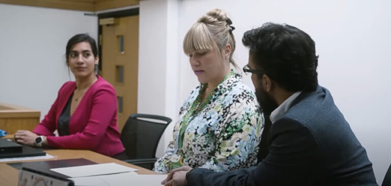 Magistrates discussing in courtroom