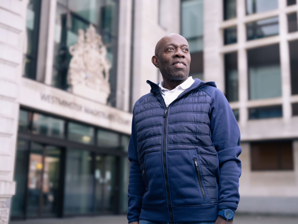 Magistrate Richard standing outside of court