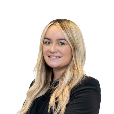 A bust view of Sasha, Head of Social Value at O'Neill & Brennan.