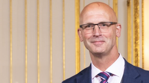 Headshot of Tim Coates