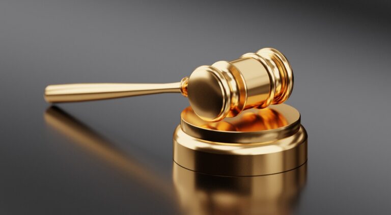 Stock image of a golden hammer and gavel