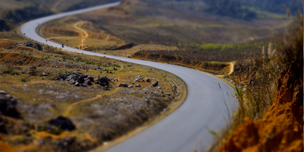 Stock image of a road leading off into the horizon