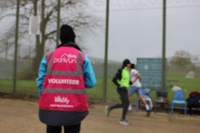 Photo of a volunteer at Parkrun HMP Feltham