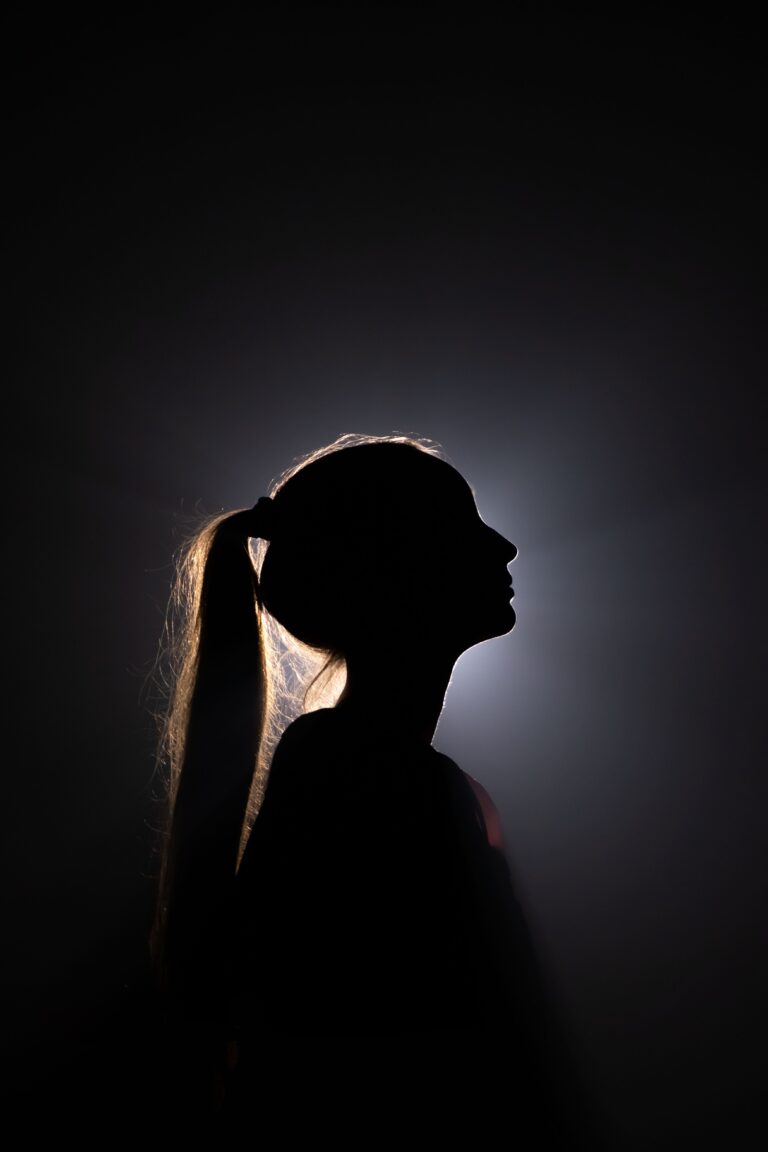 Side profile of a woman in silhouette