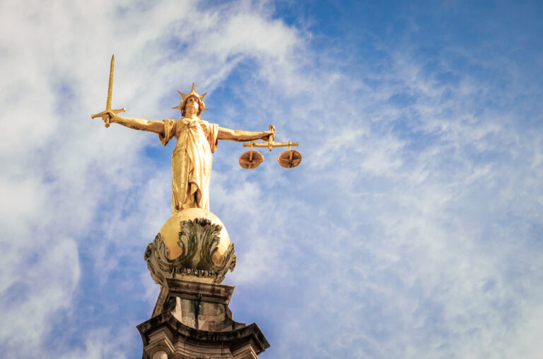 Close up of Lady Justice statue in London.