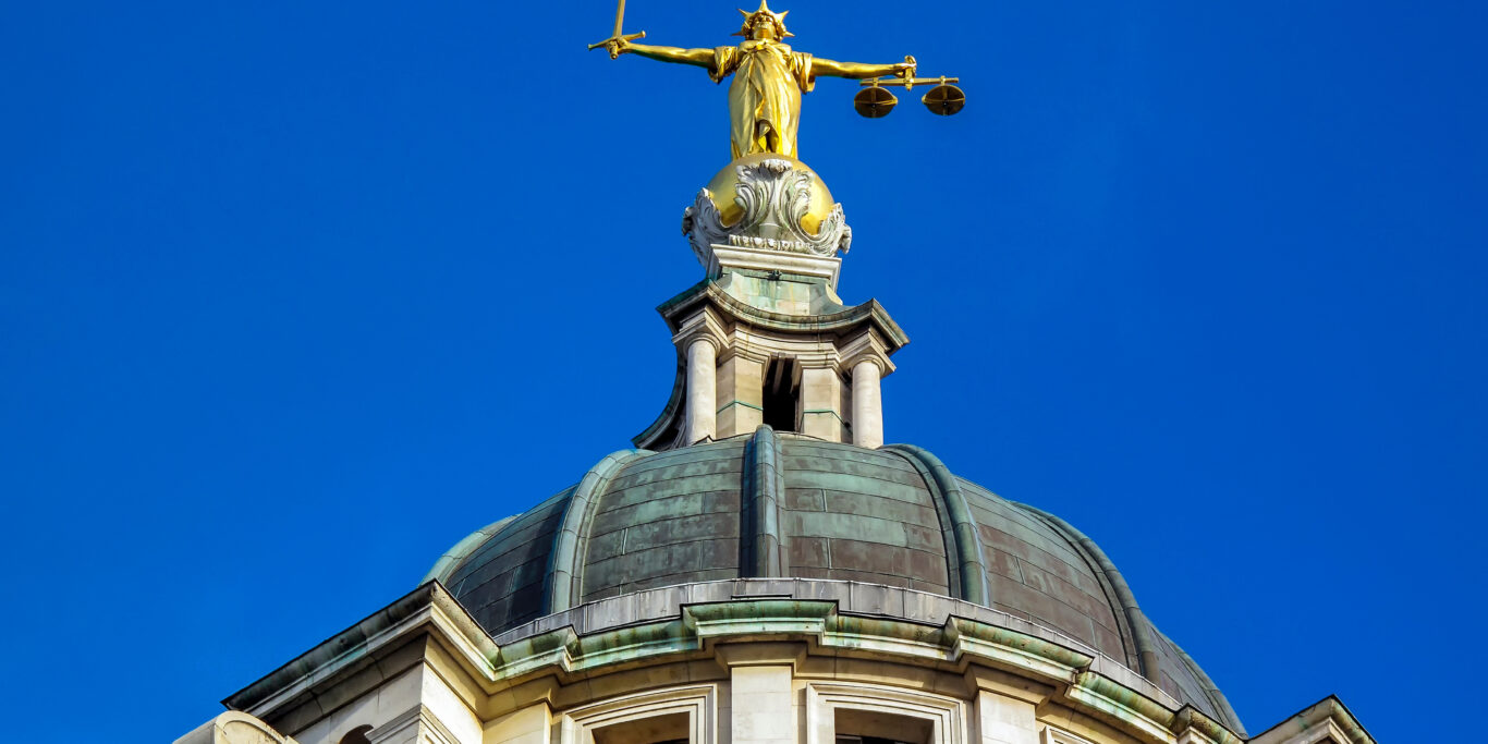Photo of the Old Bailey statue of justice.