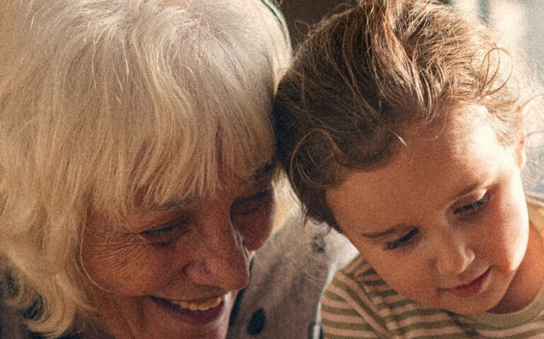 photo of older woman and child